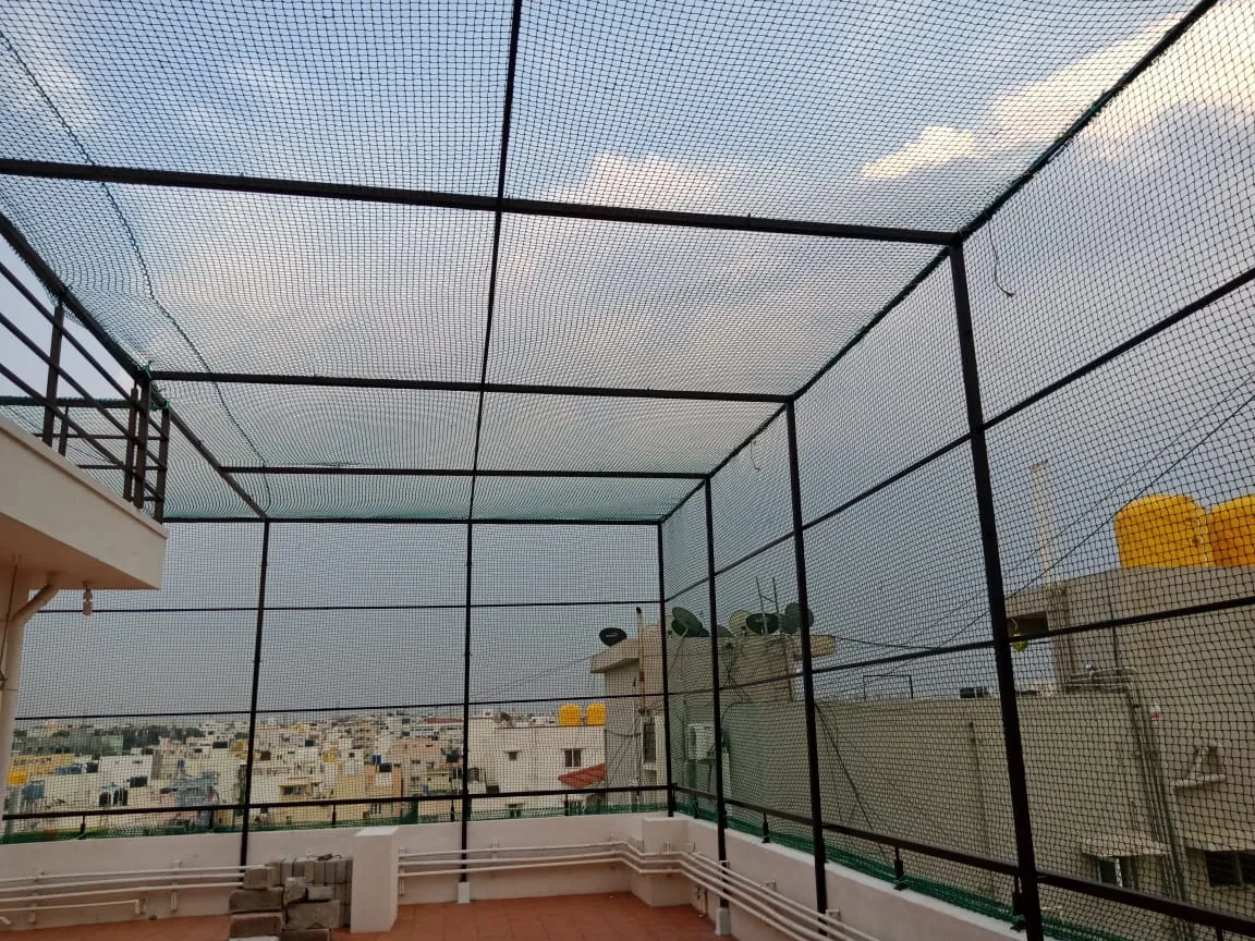 Terrace cricket practice net installation in Vadapalani